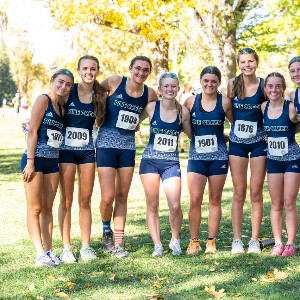 Female runners pose for photo